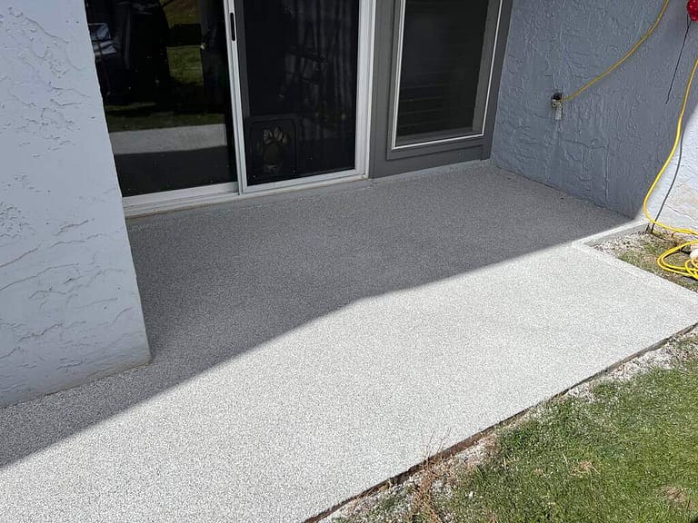 Epoxy coating on an existing concrete entrance to residential home.